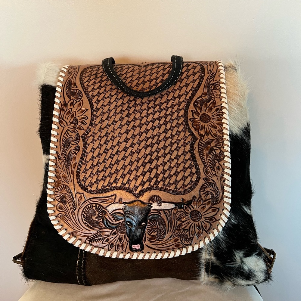 Real Leather and skin Western backpack